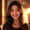 用户橘子小姐头像，年轻女性，长发，微笑，室内暖光